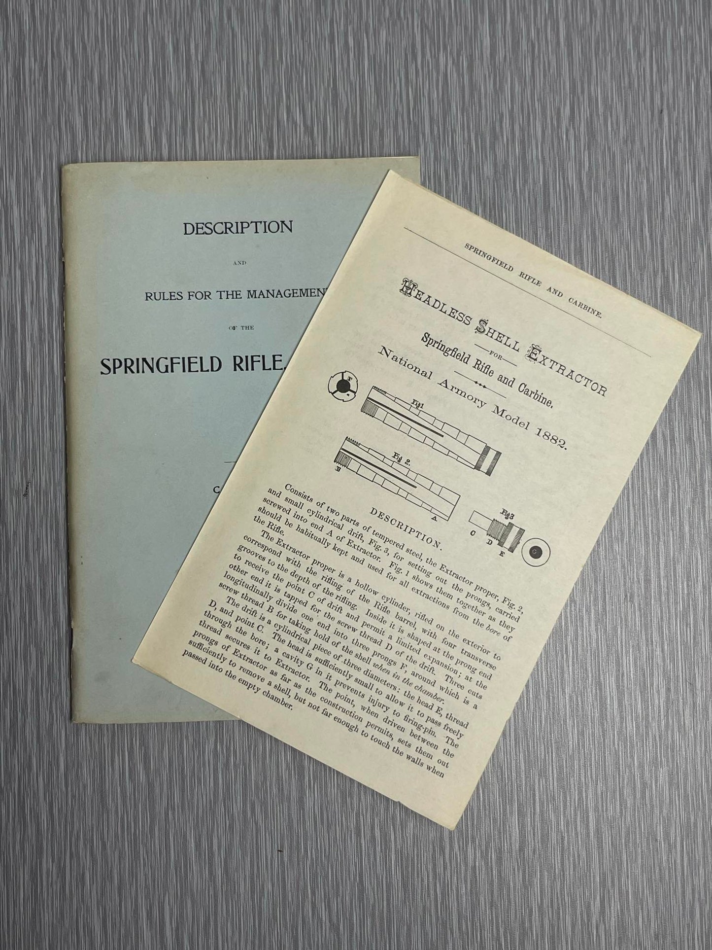 US ARMY 1898 “DESCRIPTION AND RULES FOR THE MANAGEMENT OF THE SPRINGFIELD RIFLE CARBINE CALIBER .45” BOOK W/ 1882 HEADLESS SHELL EXTRACTOR MANUAL