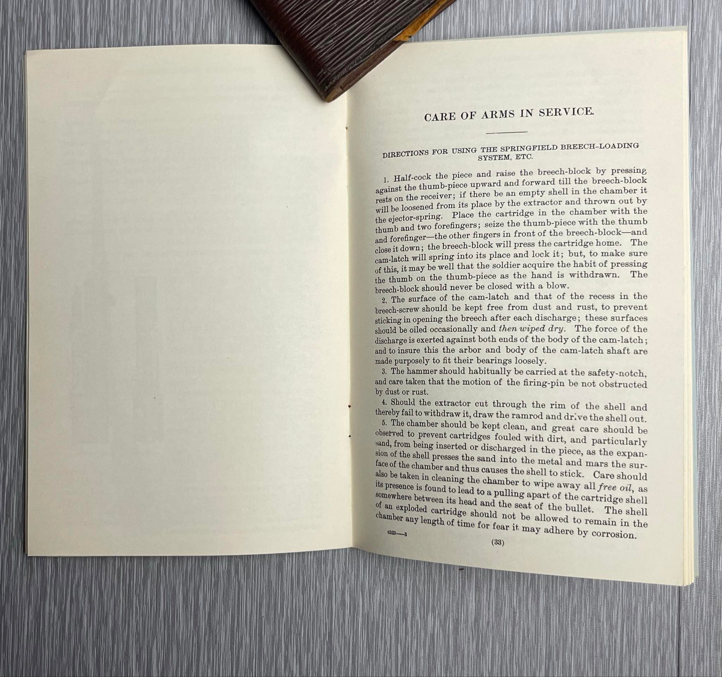 US ARMY 1898 “DESCRIPTION AND RULES FOR THE MANAGEMENT OF THE SPRINGFIELD RIFLE CARBINE CALIBER .45” BOOK W/ 1882 HEADLESS SHELL EXTRACTOR MANUAL
