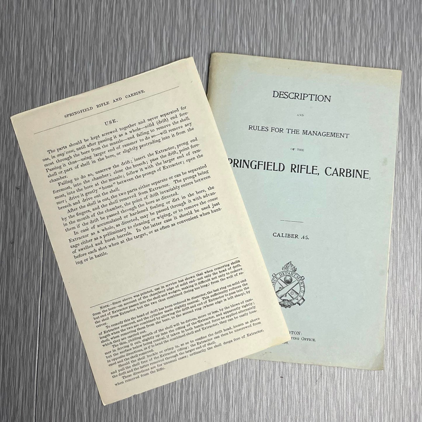 US ARMY 1898 “DESCRIPTION AND RULES FOR THE MANAGEMENT OF THE SPRINGFIELD RIFLE CARBINE CALIBER .45” BOOK W/ 1882 HEADLESS SHELL EXTRACTOR MANUAL