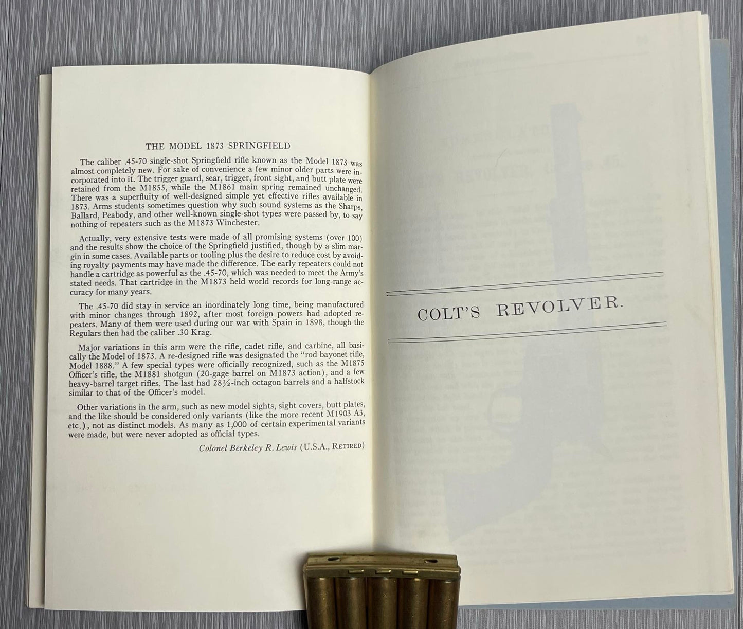 UNITED STATES ARMY 1960 SPRINGFIELD RIFLE CARBINE & ARMY REVOLVERS CALIBRE .45 W/ EXTRA HEADLESS CARTRIDGE SHELL EXTRACTOR BOOKLET