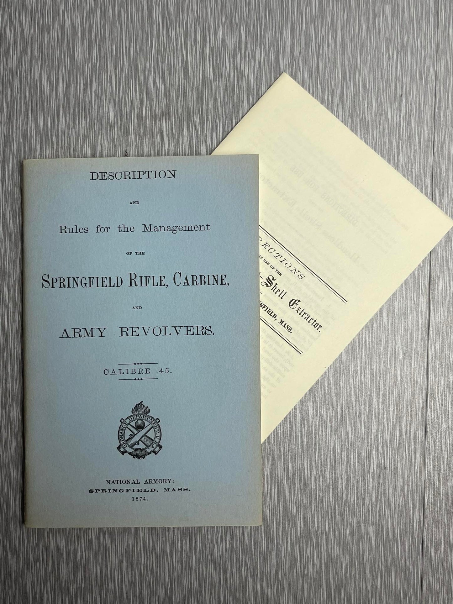 UNITED STATES ARMY 1960 SPRINGFIELD RIFLE CARBINE & ARMY REVOLVERS CALIBRE .45 W/ EXTRA HEADLESS CARTRIDGE SHELL EXTRACTOR BOOKLET