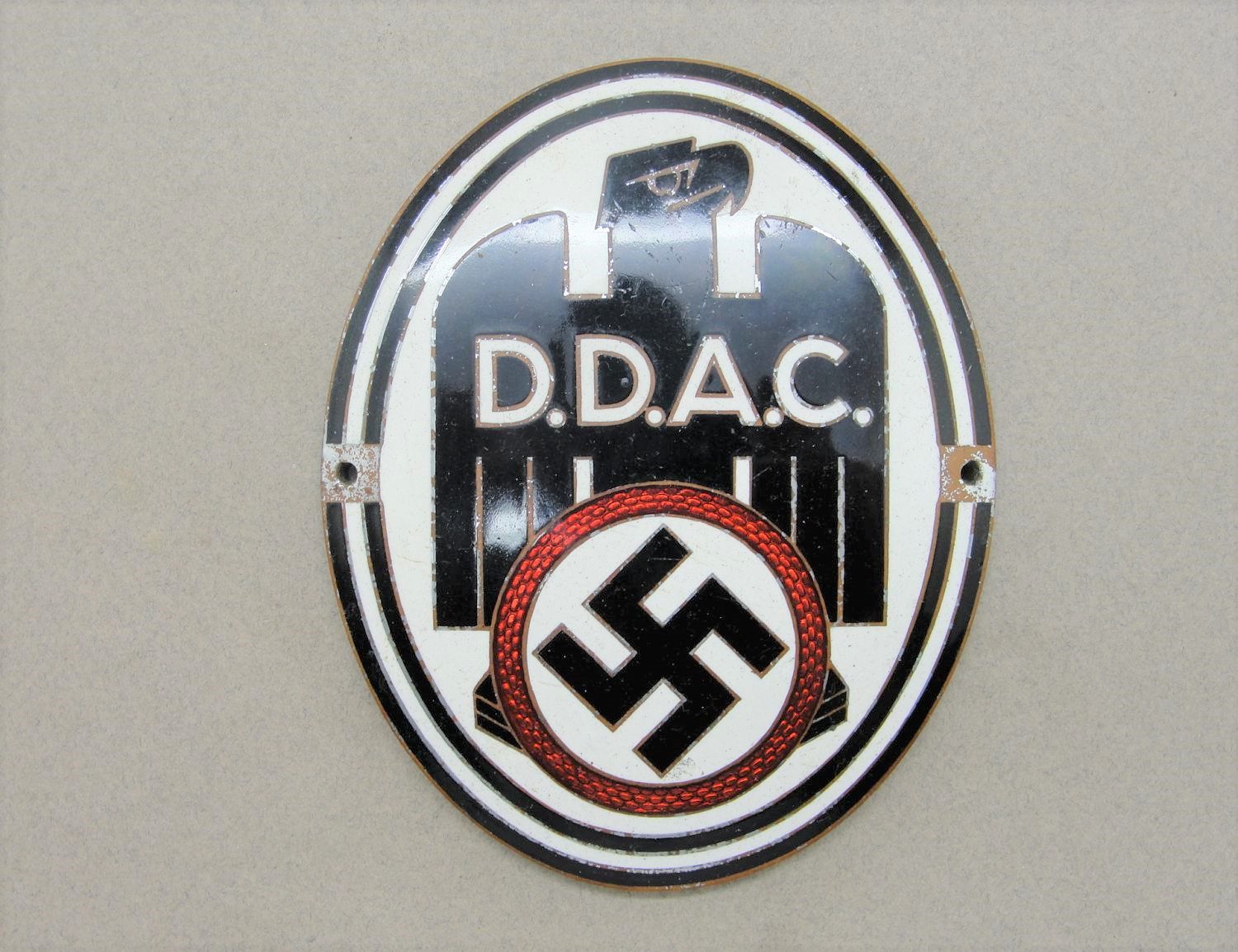 File:D.D.A.C. Der Deutsche Automobil-Club. German Third Reich Motor Club  enamelled car plate. Nazi eagle-and-swastika emblem (logotype of the  Automobile association). Hjemmefrontmuseet Rakkestad, Norway 2021-06-20 IMG  5403.jpg - Wikimedia Commons
