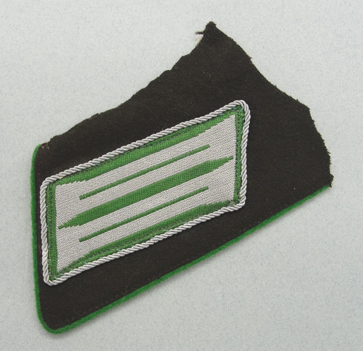 Police Officer's Collar Tab on Piece of Collar
